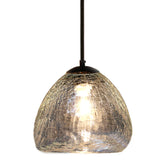 A recycled glass warm-tone clear glass pendant light on a white background