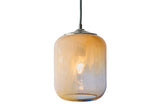 Desert sand colored glass pendant with light yellows, browns, and white in comfortable light