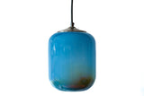 Stunning shift from the multicolored sunset-themed pendant with the light on to a blue pendant as it is turned off