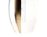 A close-up image of a gold-colored precious metal contour stripe, used as an accessory for LUMI Collection's glass pendants.