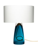 A white shade top lamp paired with a blue glass bottom with a visible gold cord passing thru the base, all on a white background.