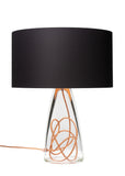 A modern lamp with a black top and glass bottom, the Perfect Statement Table Lamp for the living room, Office, or Bedside.  