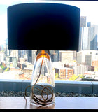 A modern glass lamp on the top of a building in Seattle